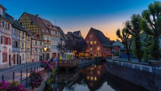 A row of houses along a canal